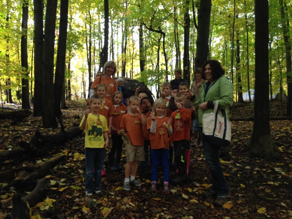 Pictured here on one of Blandford Nature Center’s trails is a group of students and teachers from Alllendale Christian Elementary School with a Blandford volunteer as their guide.  Last year nine thousand school children toured the Center’s 143 acres of woods inside the city of Grand Rapids. 